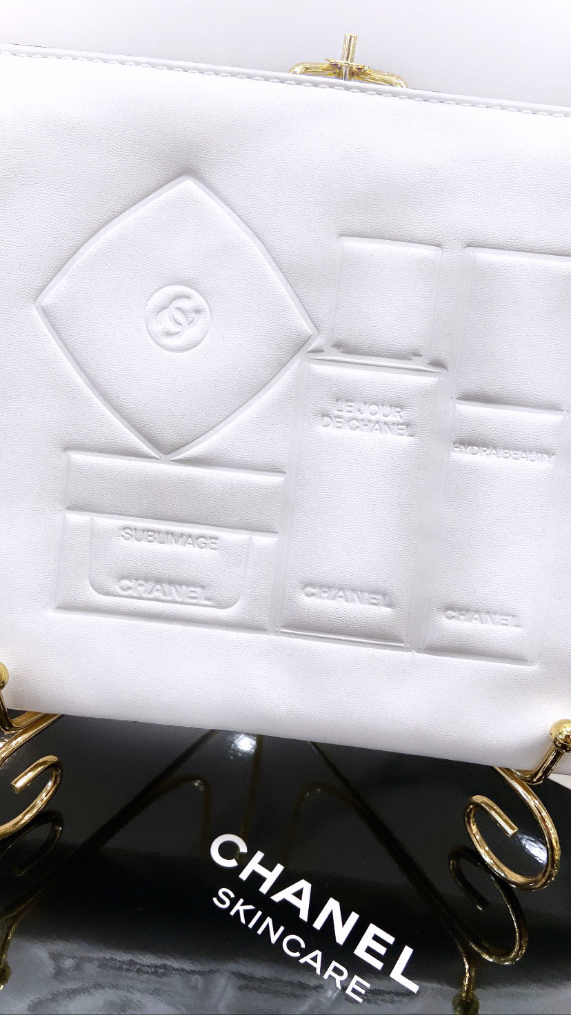 Chanel - Embossed Leather Cosmetic Bag – HandpickedInc